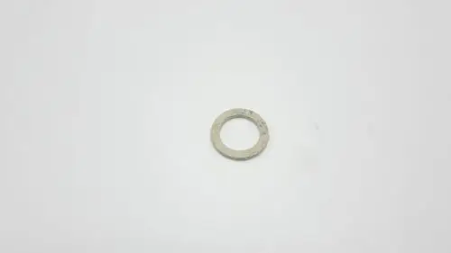 Unterlegscheibe aus Metall mit Rundung, auf einer weißen Fläche. Das Produkt wird von der Marke Remeha verwendet.